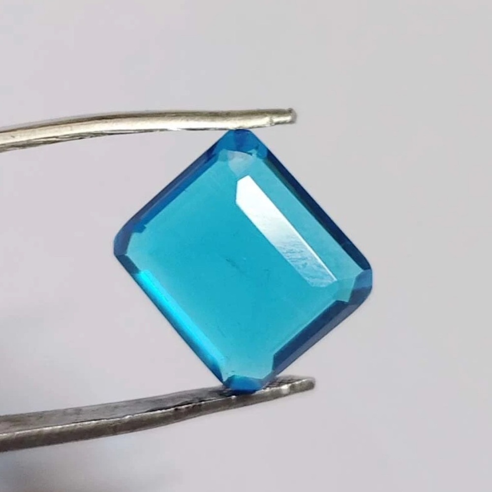 Elegant Blue Certified Natural 29.00 ct. Emerald Cut Topaz